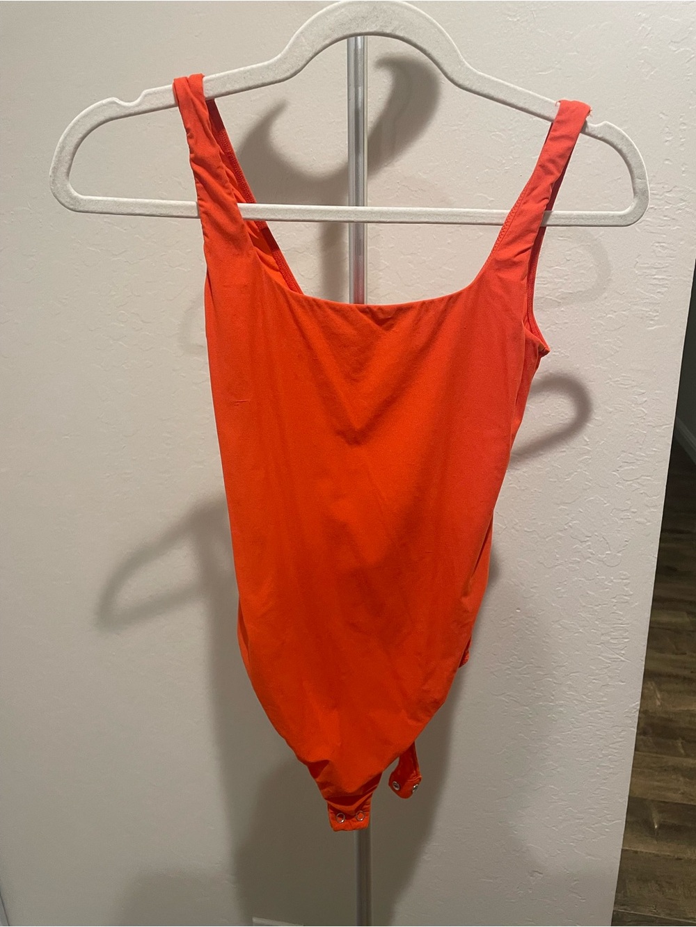 Bright Orange One-Piece Bodysuit